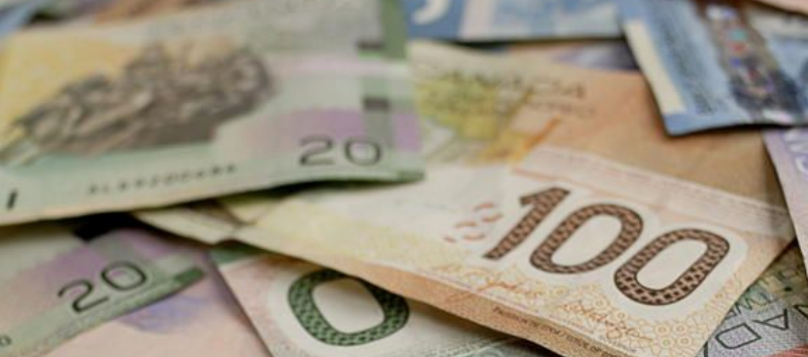 a pile of Canadian money