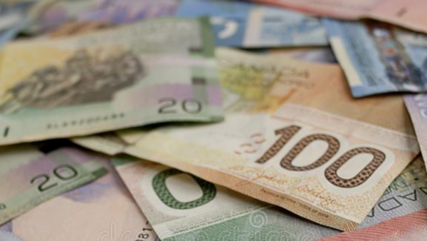 a pile of Canadian money